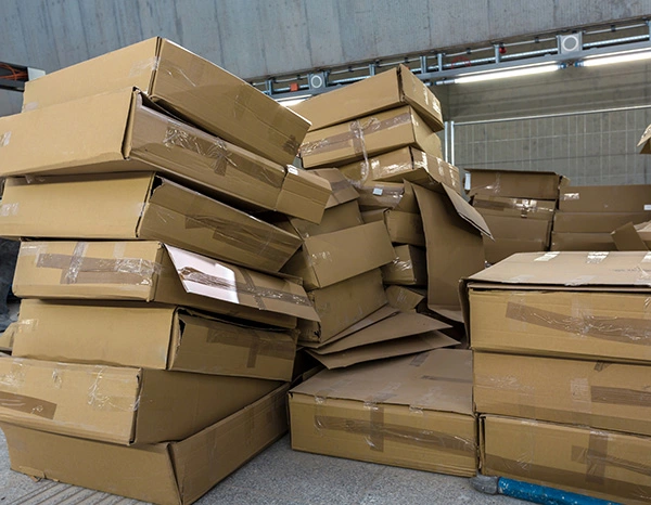 Retail Reverse Logistics and Materials Management Post-consumer cardboard materials prepared for recycling