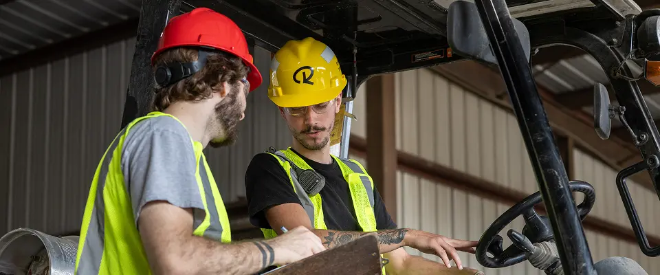 Radius Recycling team reviewing scrap material details to provide a price quote