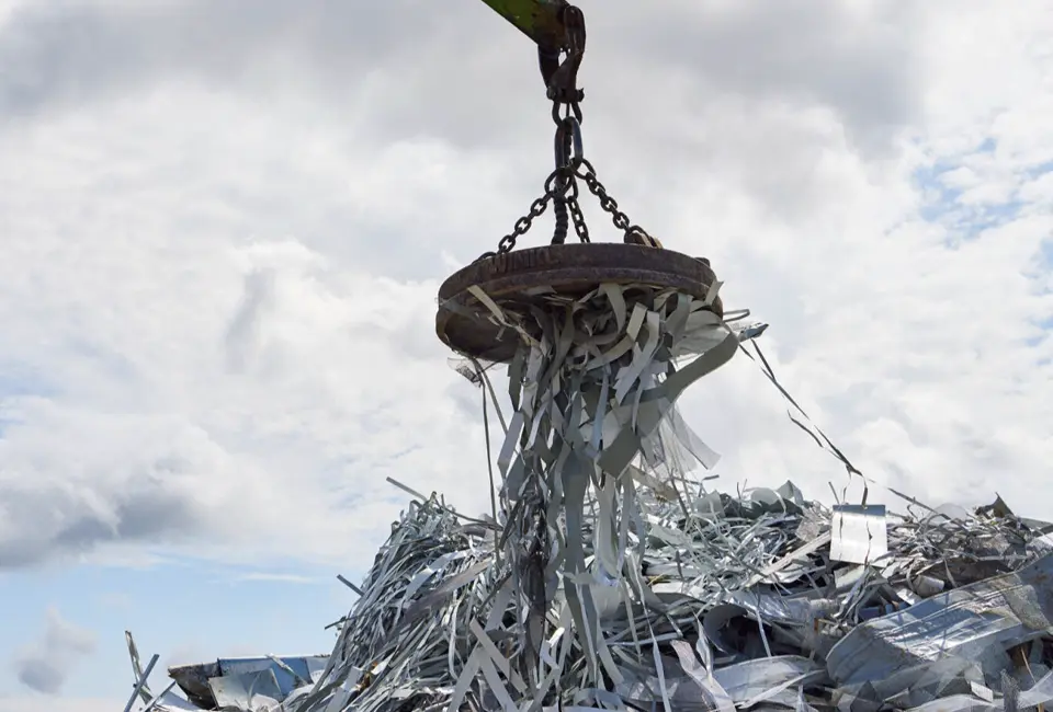 Magnet lifting scrap steel during scrap steel recycling and processing