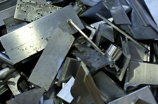 Nonferrous metal scrap including aluminum pieces