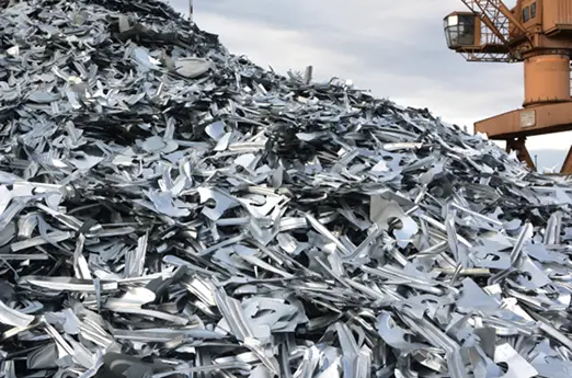 Pile of shredded ferrous scrap metal processed